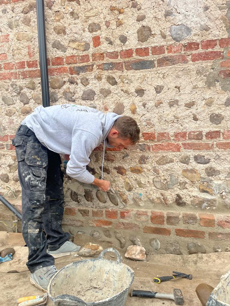 Rebuilding a cobblestone wall in Whixley. Harrogate