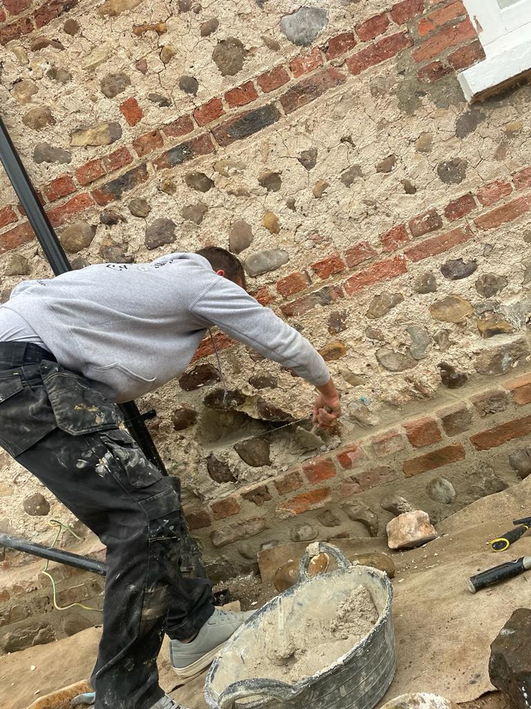 Rebuilding a cobblestone wall in Whixley. Harrogate