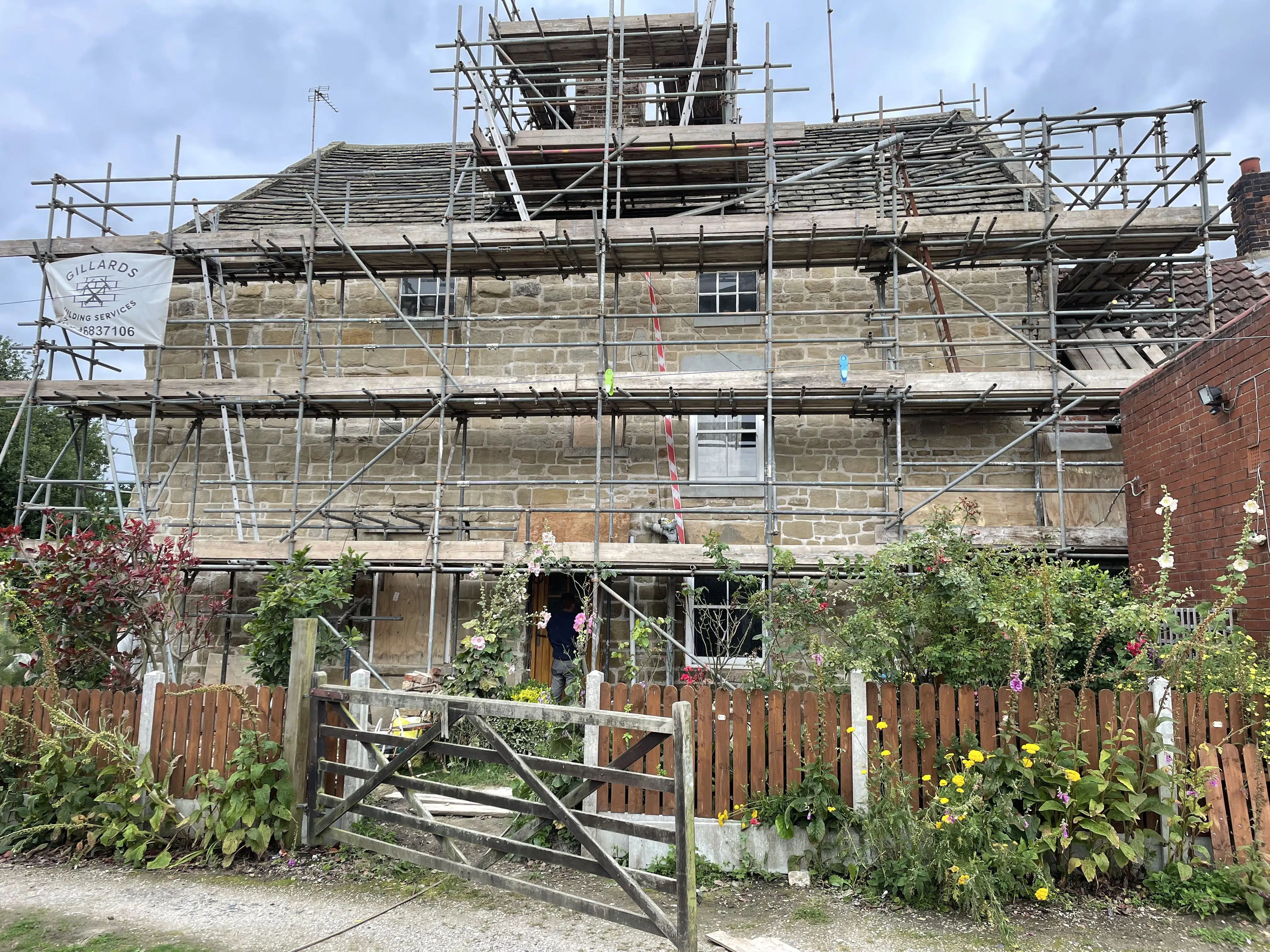 Hot lime pointing applied after removing the non-porous materials from the walls at Grange Farm a Grade II Listed building in Darrington, Pontefract