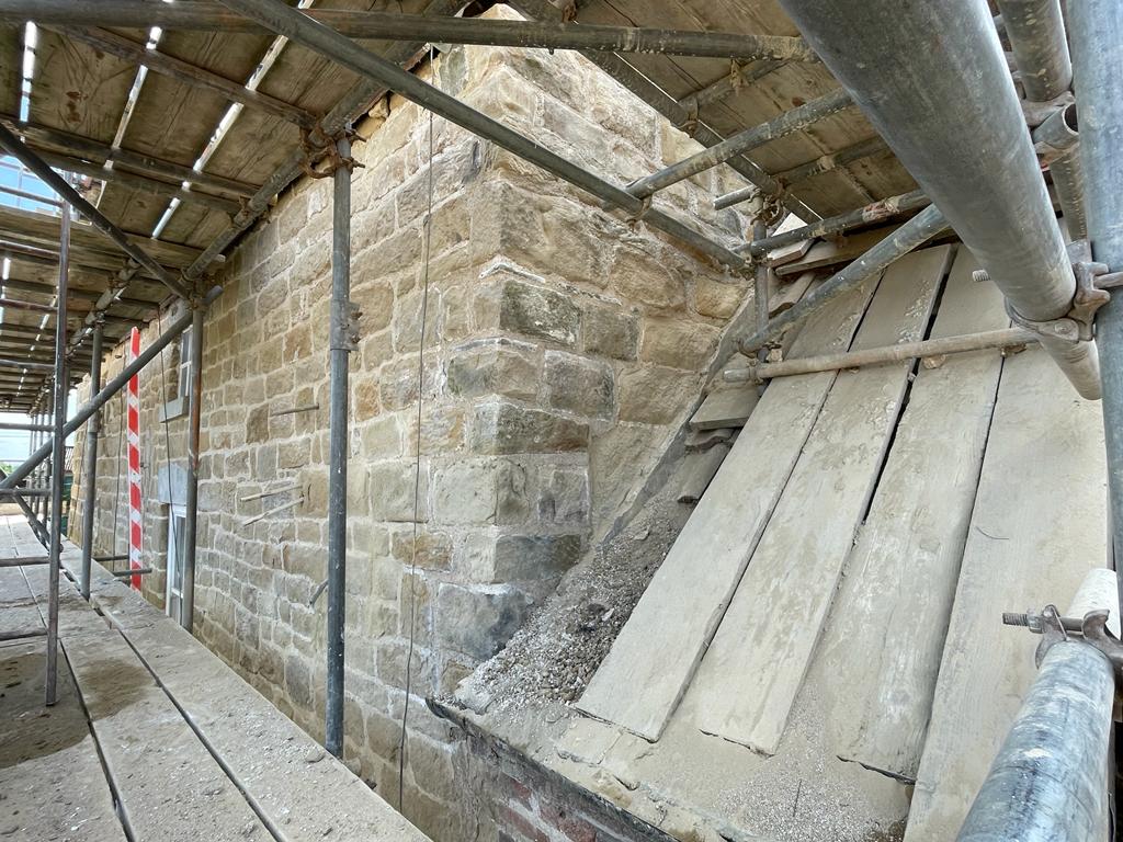 Stone gable rebuild after render removal