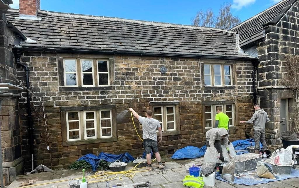 Heritage building preservation. Masonry repairs. hot lime mortar pointing at The old cottage Chapelthorpe, Wakefield, West Yorkshire